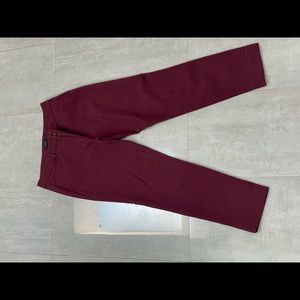 Burgundy slim cropped work pants.